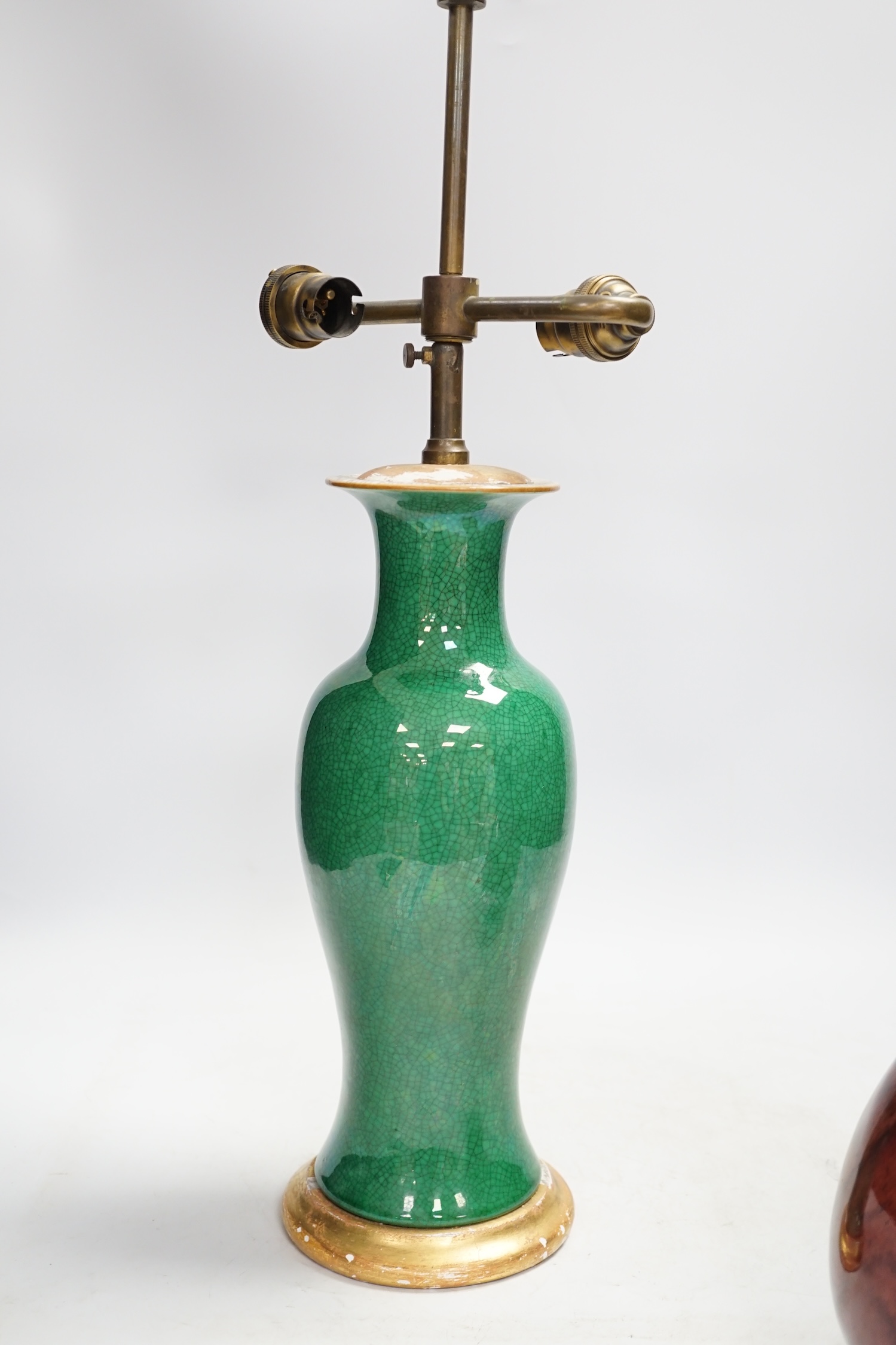 A Chinese green crackle glazed vase converted to a lamp base and a flambé style vase, lamp base 50cm high including light fitting. Condition - fair, losses to the gilt base of lamp base